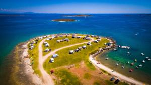 an aerial view of an island in the ocean at Arena Stupice Mobile Homes in Premantura