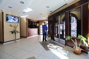 TV a/nebo společenská místnost v ubytování Rumi Hotel