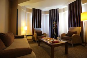 Posezení v ubytování Rumi Hotel