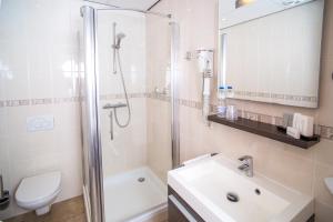 Koupelna v ubytování Hotel de Gulden Leeuw