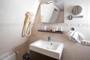 Koupelna v ubytování Hotel de Gulden Leeuw
