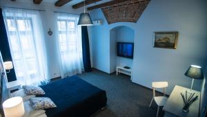 Телевізор і / або розважальний центр в Central Hotel