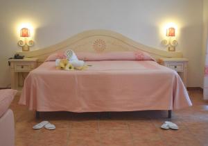 Postel nebo postele na pokoji v ubytování Hotel Montiruju