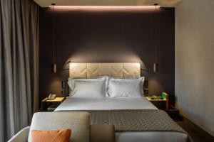 Postel nebo postele na pokoji v ubytování Hotel VIU Milan, a Member of Design Hotels