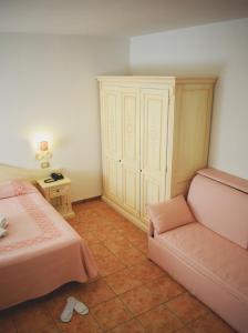 Postel nebo postele na pokoji v ubytování Hotel Montiruju