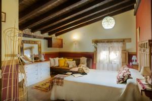 Posteľ alebo postele v izbe v ubytovaní Casa Rural la Casa del Bosque