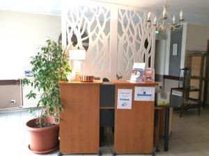 Vstupní hala nebo recepce v ubytování LOGIS Hotel Restaurant Auberge Du Cheval Blanc