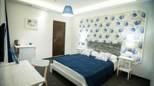 Ліжко або ліжка в номері Central Hotel