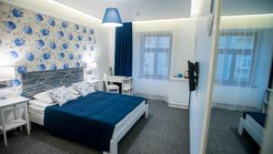 Ліжко або ліжка в номері Central Hotel