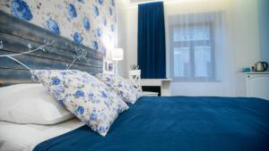 Ліжко або ліжка в номері Central Hotel