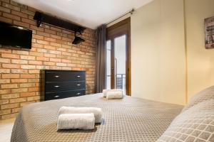 Posteľ alebo postele v izbe v ubytovaní Hotel Montmar