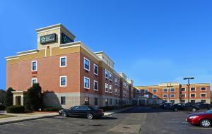 a building with a clock on the top of it at Extended Stay America Suites - Chicago - Skokie in Skokie