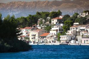 a town on the shore of a body of water at Apartment Blašković in Novigrad Dalmatia