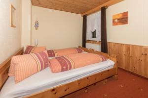 Postel nebo postele na pokoji v ubytování Almhaus Blümel