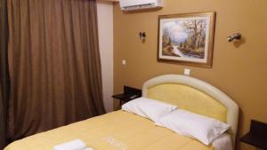 Letto o letti in una camera di Hotel Drosia