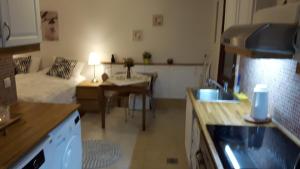 Kuchyň nebo kuchyňský kout v ubytování BSG Apartments
