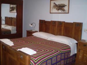 A bed or beds in a room at Mulino Della Ricavata