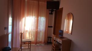 TV a/nebo společenská místnost v ubytování Hotel Patrizia