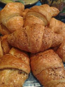a pile of pastries sitting on top of a plate at B&B Cà d'Artisti in Caorle