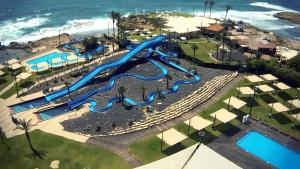 an aerial view of a water park at 2 bedroom apartment in Atlit, Haifa district in Atlit