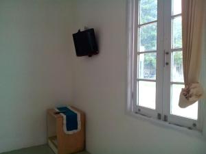 TV a/nebo společenská místnost v ubytování Pari Solata Seaview Homestay Syariah