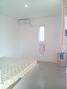Postel nebo postele na pokoji v ubytování Pari Solata Seaview Homestay Syariah + 37 fotografií