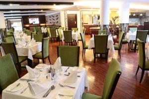 
A restaurant or other place to eat at Jupiter International Hotel - Cazanchis
