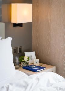A bed or beds in a room at One96
