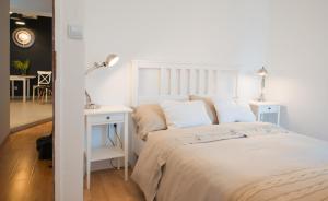 Posteľ alebo postele v izbe v ubytovaní Grisia 26 Apartment