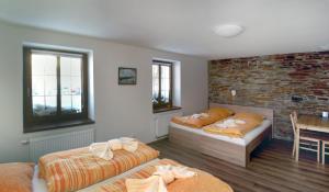 Postel nebo postele na pokoji v ubytování Apartments Stein
