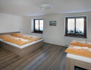 Postel nebo postele na pokoji v ubytování Apartments Stein