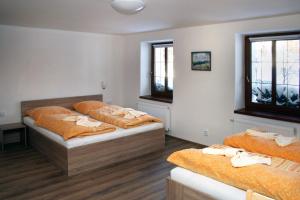 Postel nebo postele na pokoji v ubytování Apartments Stein