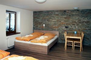 Postel nebo postele na pokoji v ubytování Apartments Stein