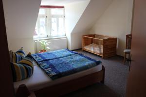 En eller flere senge i et værelse på Ferienwohnungen Patsch