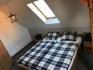 En eller flere senge i et værelse på Penzión Dobré Časy