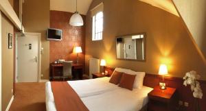 Voodi või voodid majutusasutuse Hotel Johannes Vermeer Delft toas