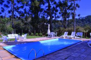 A piscina localizada em Hotel Refúgio Alpino ou nos arredores