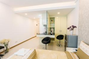 Posezení v ubytování CA&SA Serviced Apartment