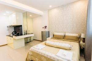 Kuchyň nebo kuchyňský kout v ubytování CA&SA Serviced Apartment