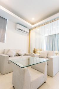 Posezení v ubytování CA&SA Serviced Apartment