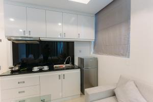 Kuchyň nebo kuchyňský kout v ubytování CA&SA Serviced Apartment