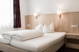 Posteľ alebo postele v izbe v ubytovaní Appartements Solaris