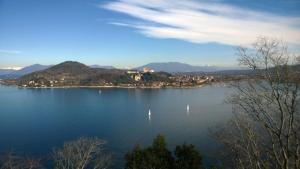 a view of a lake with sailboats in the water at casa luminosa in Arona