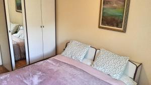 Postel nebo postele na pokoji v ubytování Apartment Maras