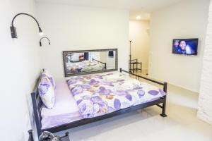 Ένα ή περισσότερα κρεβάτια σε δωμάτιο στο Aloha Apartments with pool +71 φωτογραφίες