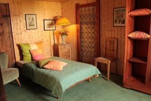 Tempat tidur dalam kamar di Zum Ginkgobaum