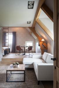 Posezení v ubytování B&B De Lievde