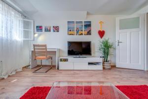 Телевизор и/или развлекательный центр в Apartment Bačvice Holiday with free parking