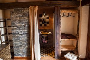 A bed or beds in a room at Orgullo Rural