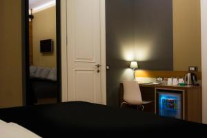 Postel nebo postele na pokoji v ubytování B&B Wimbledon Garni Concept